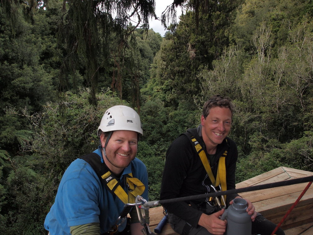 Andrew and Nick sitting on the new platform at the start of the longest zipline